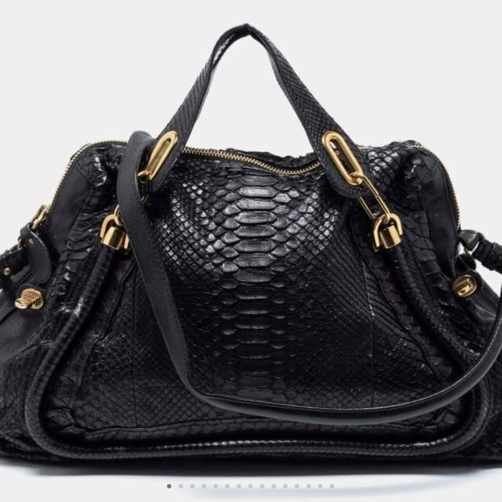 Besso black python leather bag. Top handles and shoulder strap.